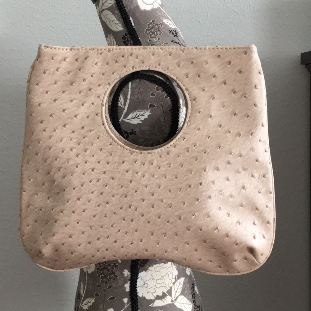 Faux leather textured tan hole clutch